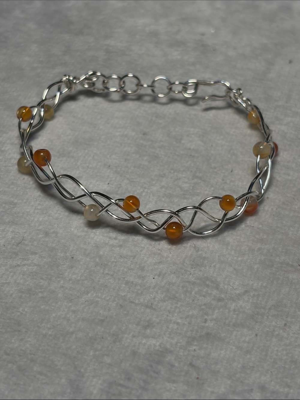 Silver-Tone Twisted Wire Bracelet with Amber and Cream Beads